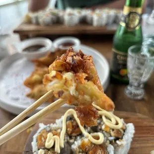 Umi tempura with sweet potato, asparagus, carrots, and onions