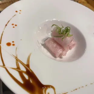 a plate of food with sauce