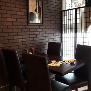 a table and chairs in a restaurant