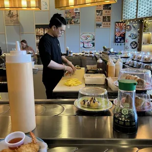 Hard at work making delicious sushi