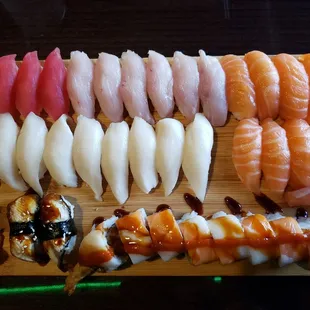 Tuna, yellowtail, salmon, white tuna (escolar), eel and signature roll (forgot the name).