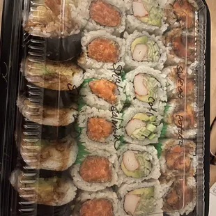 6 Piece Sweet Potato Roll, 6 Piece California Roll, Spicy Salmon Roll, 5 Piece Shrimp Tempura Roll,