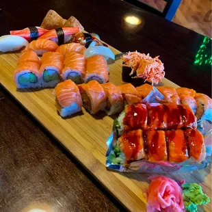 crab, white tuna, inari, squid, spicy crab, tiger roll, crazy salmon roll, dragon on fire roll
