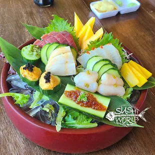 Sashimi spread featuring  Ikura, Uni, Japanese Jumbo Scallops, Red Snapper, Escolar, Tamago, and of course, our Bluefin Tuna