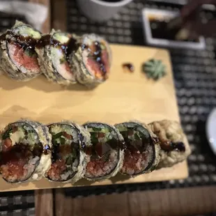 sushi rolls on a cutting board