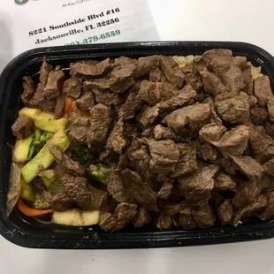 beef and vegetables in a plastic container