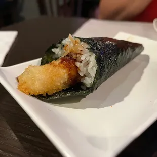 a close up of a sushi on a plate