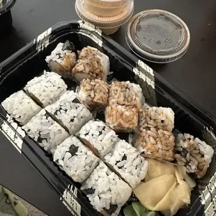 Spicy Kani Roll (top), Alaska Roll (bottom), with sauces