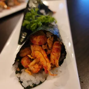 Crawfish Hand roll! Not that tasty without crawfish sauce and no, I wouldn't dip this into soy and wasabi.
