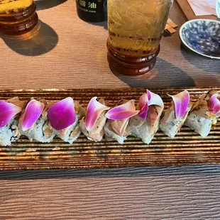 The Memorial Roll - salmon, crab salad, topped with seared toro and orchid. Phenomenal!