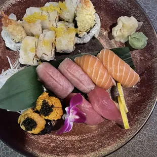 Uni is expensive but very fresh! Carolina roll. Salmon, Tuna, fatty tuna.
