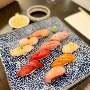 Omakase $59 - 10 pc nigiri + handroll after