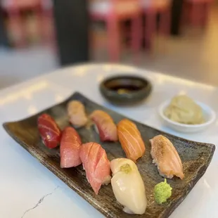 various types of sushi on a plate