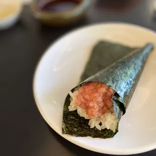 a sushi roll on a plate