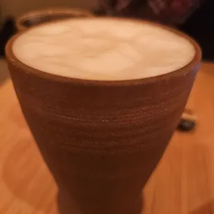 Beer Served in Pottery Cup.
