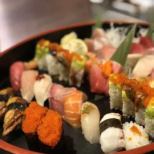 various types of sushi on a plate