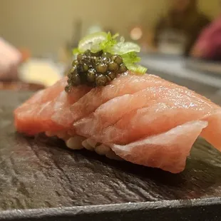 a close up of a piece of sushi