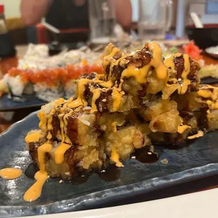 a plate of sushi on a table