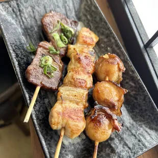 Yakitori (from left: beef skirt, chicken thigh with green onion, scallop)