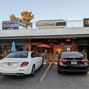 Outside. Storefront. Small patio. Main front entrance.