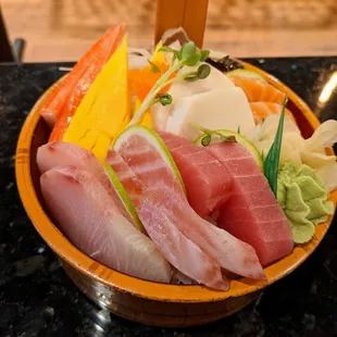 Chirashi Don. Assorted sashimi served over rice. $23.95.