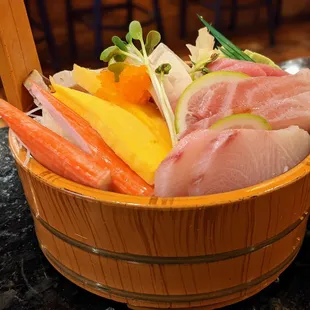 Chirashi Don. Assorted sashimi served over rice. $23.95.