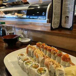 seattle roll, polar bear &amp; crouching tuna hidden shrimp roll.