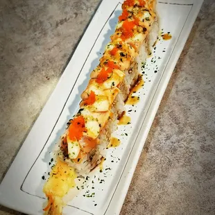 Sabino roll, Shrimp tempura, seared salmon, mayo, teriyaki sauce, anori and masago