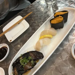 Eggplant, scallop, and uni nigiri