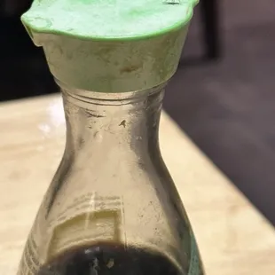 More fruit flies enjoying soy sauce