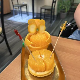 free orange cut into a cute bear shape