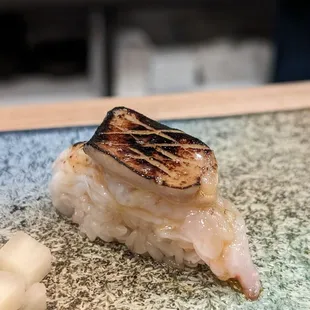 a close up of a piece of food on a plate