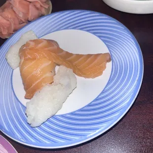 Thinly sliced salmon nigiri