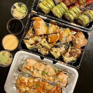Flamin Hot Roll, Dragon Roll, Mango-nificant Roll, Caterpillar Roll, Salmon Lover Roll, and Lobster Roll.
