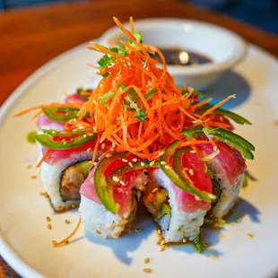 a plate of sushi on a table