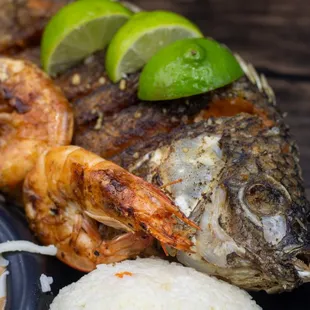 a plate of seafood and rice