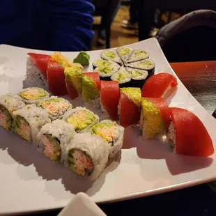 Front to back, California roll (standard roll) Boston (specialty roll) and cucumber nigiri (standard)
