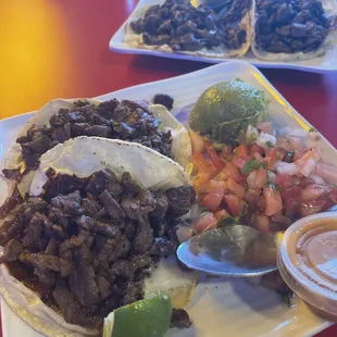 Pinches Tacos! Fresh made tortillas with crispy melted cheese on top! The beef is well seasoned &amp; tender! We would come for the tacos alone!