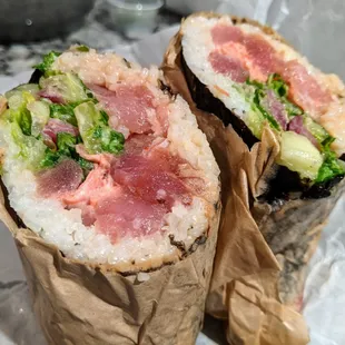 R.D. Yoo sushi burrito. Poke-marinated tuna, lettuce, cucumber, pickled red onion, pickled ginger, cucumber wasabi sauce. $11.50.