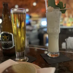 Lychee coconut cocktail and sapporo beer