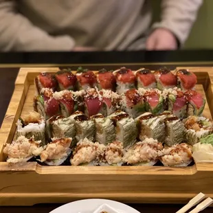 From top to bottom: sushishima roll, Fuji roll, sumo roll, and Phoenix roll.