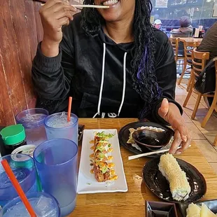  woman eating at a restaurant