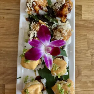 (f042) Popcorn Shrimp Roll and (f046) Spicy Salmon Roll