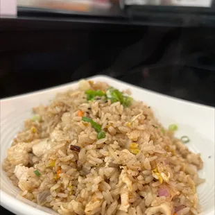 a plate of rice and vegetables
