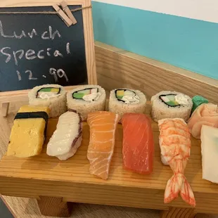 a board with sushi on it