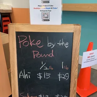 a blackboard with a price list on it