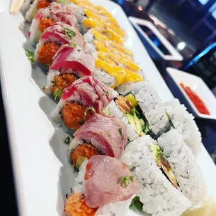 a row of sushi rolls