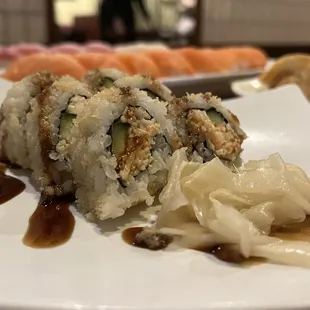 a plate of sushi on a table