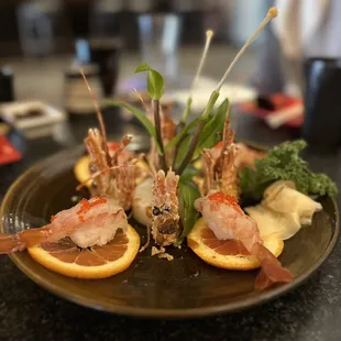 a plate of sushiya on a table