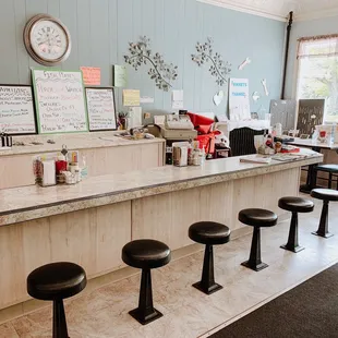 A long bar area for reading the paper and a cup of coffee.